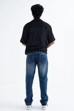 Load image into Gallery viewer, back standing of straight fit blue jeans